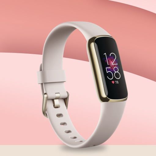 Monytre connécte de couleur blanche sur fond rose et rose foncé